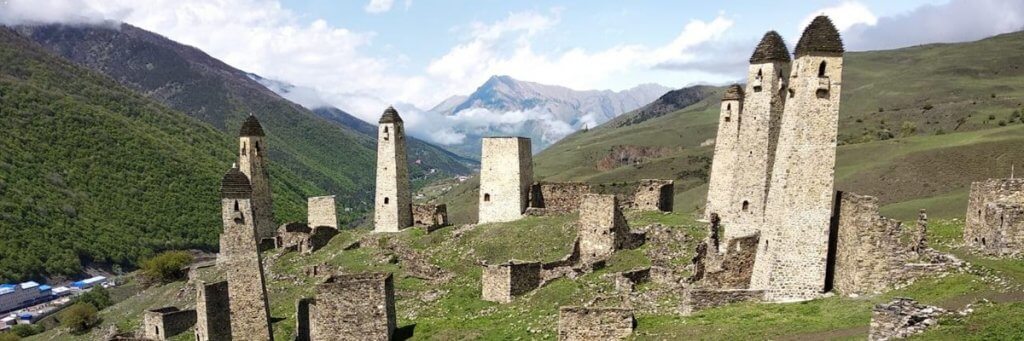 Ruins of ancient settlement in the Caucasus mountains (tombs and sarcophagus
